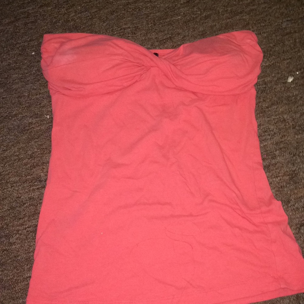 Med. sleeveless shirt.